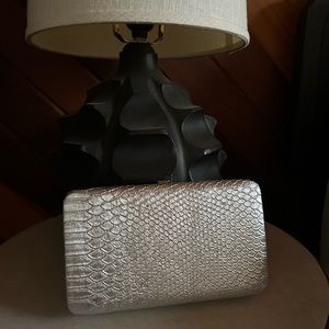 Silver snakeskin texture clutch